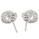 Elegant silver earrings featuring a unique cut-out design, perfect for adding a touch of sophistication to any outfit.